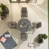 Nova Outdoor Fabric Hugo Light Grey 4 Seat Round Dining Set