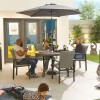 Nova Outdoor Fabric Hugo Light Grey 4 Seat Round Dining Set