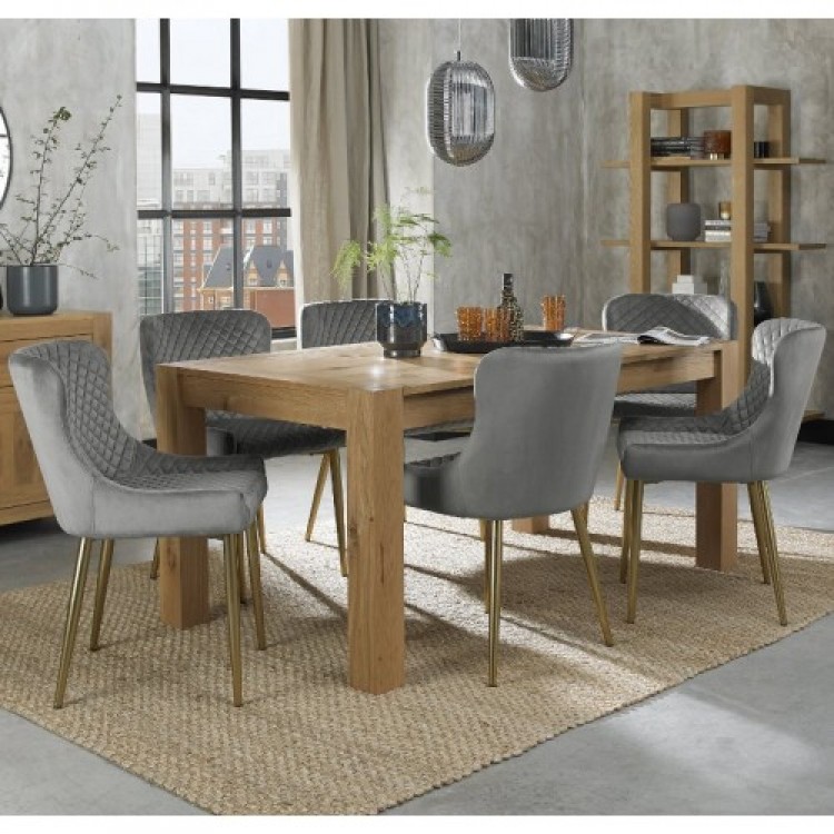 Bentley Designs Turin Light Oak 6-8 Seater Dining Table With 6 Cezanne Grey Velvet Matt Gold Plated Legs Chairs