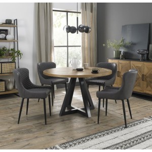 Bentley Designs Indus Rustic Oak 4 Seater Round Dining Table With 4 Cezanne Dark Grey Faux Leather Chairs Bentley Designs Indus Rustic Oak 4 Seater Round Dining Table With 4 Cezanne Dark Grey Faux Leather Chairs