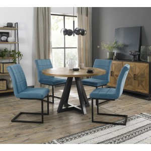 Bentley Designs Indus Rustic Oak 4 Seater Round Dining Table With 4 Lewis Petrol Blue Velvet Cantilever Chairs Bentley Designs Indus Rustic Oak 4 Seater Round Dining Table With 4 Lewis Petrol Blue Velvet Cantilever Chairs