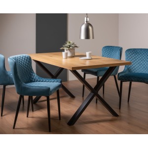 Bentley Designs Ramsay Rustic Oak Effect Melamine 6 Seater X Leg Dining Table With 4 Cezanne Petrol blue Velvet Fabric Chairs Bentley Designs Ramsay Rustic Oak Effect Melamine 6 Seater X Leg Dining Table With 4 Cezanne Petrol blue Velvet Fabric Chairs