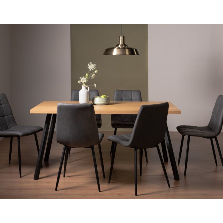 Bentley Designs Ramsay Rustic Oak Effect Melamine 6 Seater Dining Table with 6 Mondrian Dark Grey Faux Leather Chairs