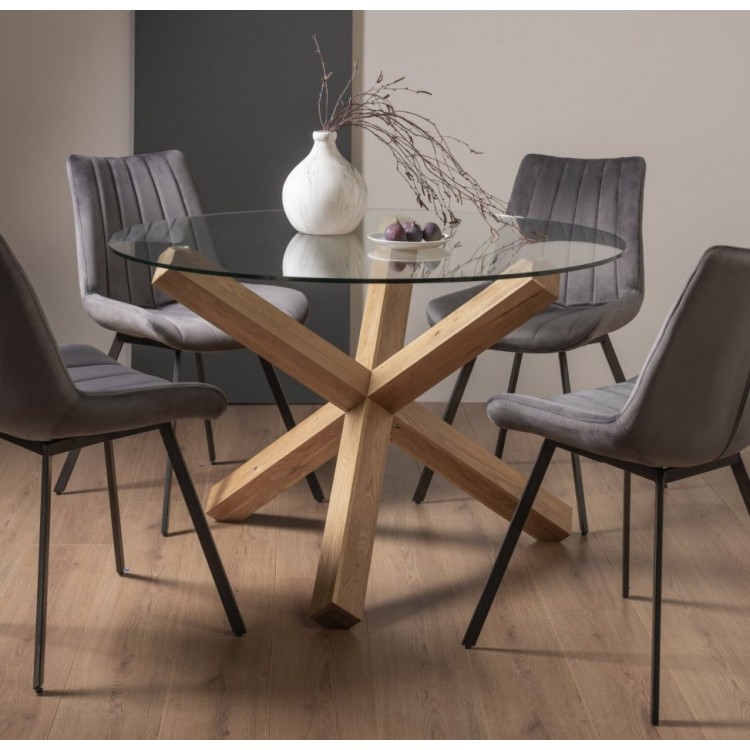 Bentley DesignsTurin Clear 120cm Round 4 Seater Glass Dining Table with 4 Fontana Grey Velvet Fabric Chairs