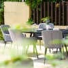 Maze Lounge Outdoor Fabric Zest 6 Seat Oval Dining Set in Flanelle